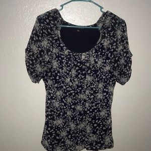 Blue shirt with white floral pattern